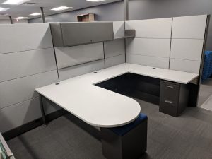 cubicle with a u-shaped desk
