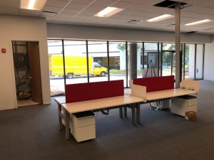 Office tables with red dividers