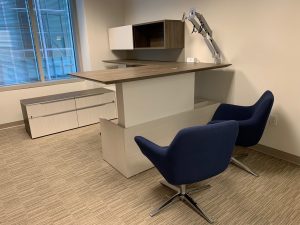 Office desk with blue chairs
