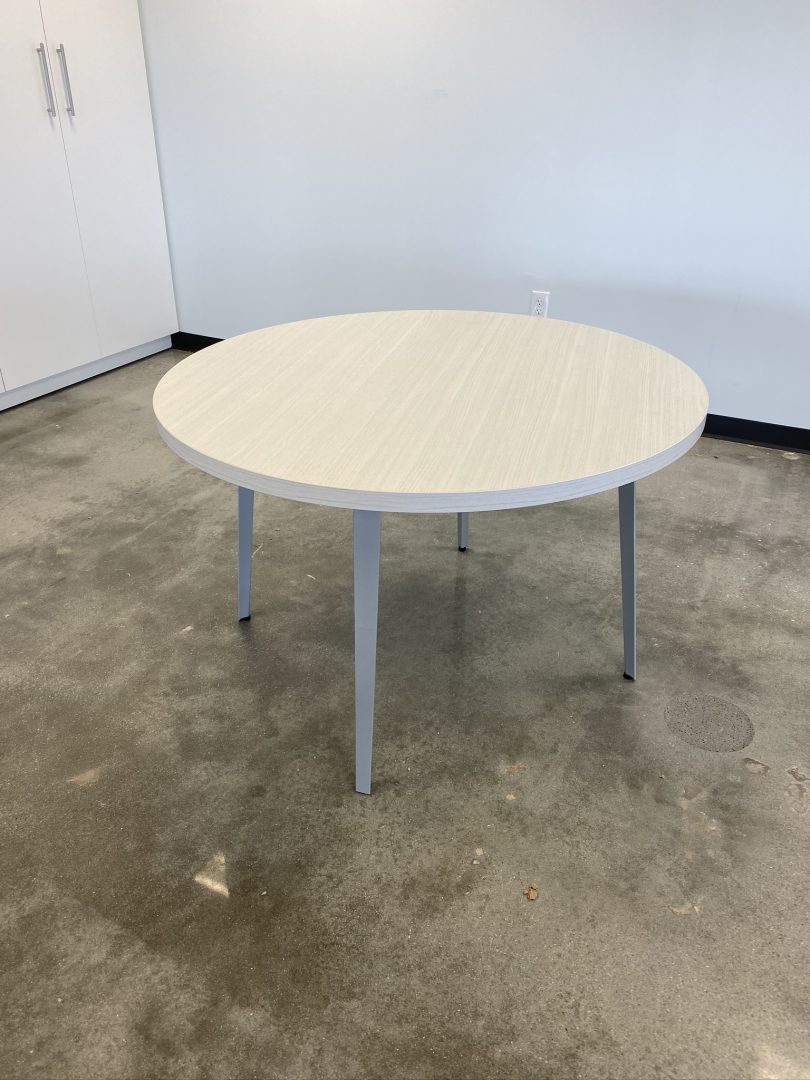 A white round table