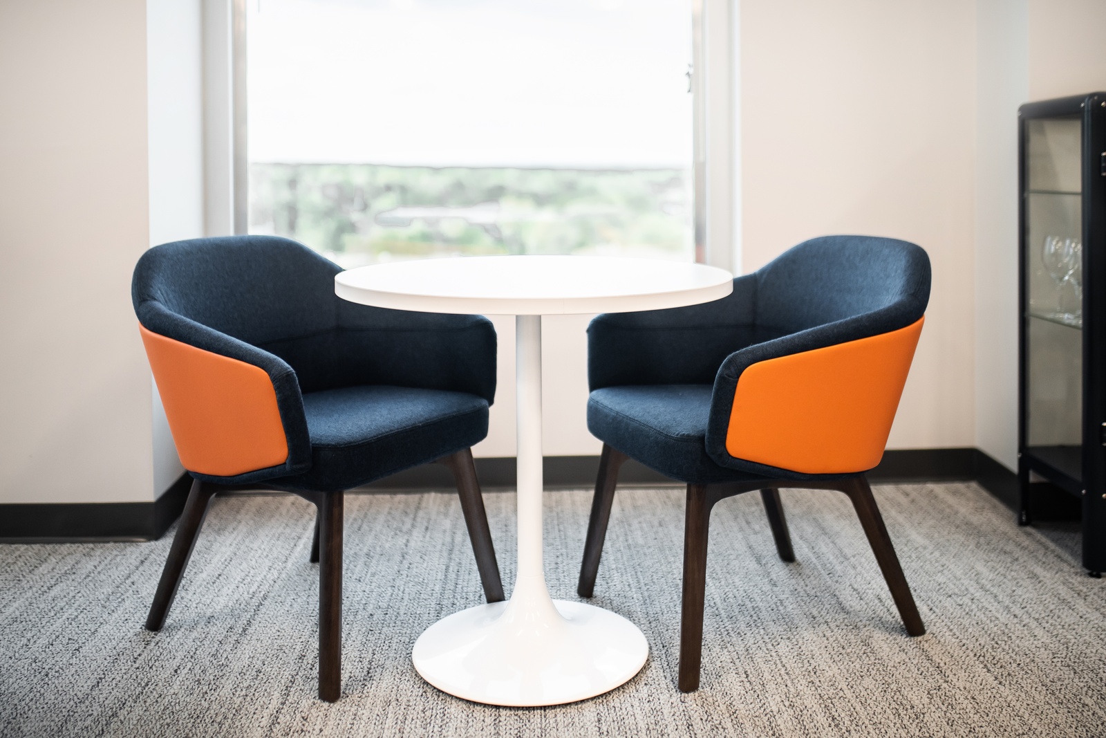Blue chairs with orange arms