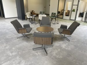 Grey chairs around a table