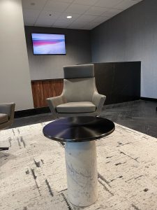 A grey chair and table